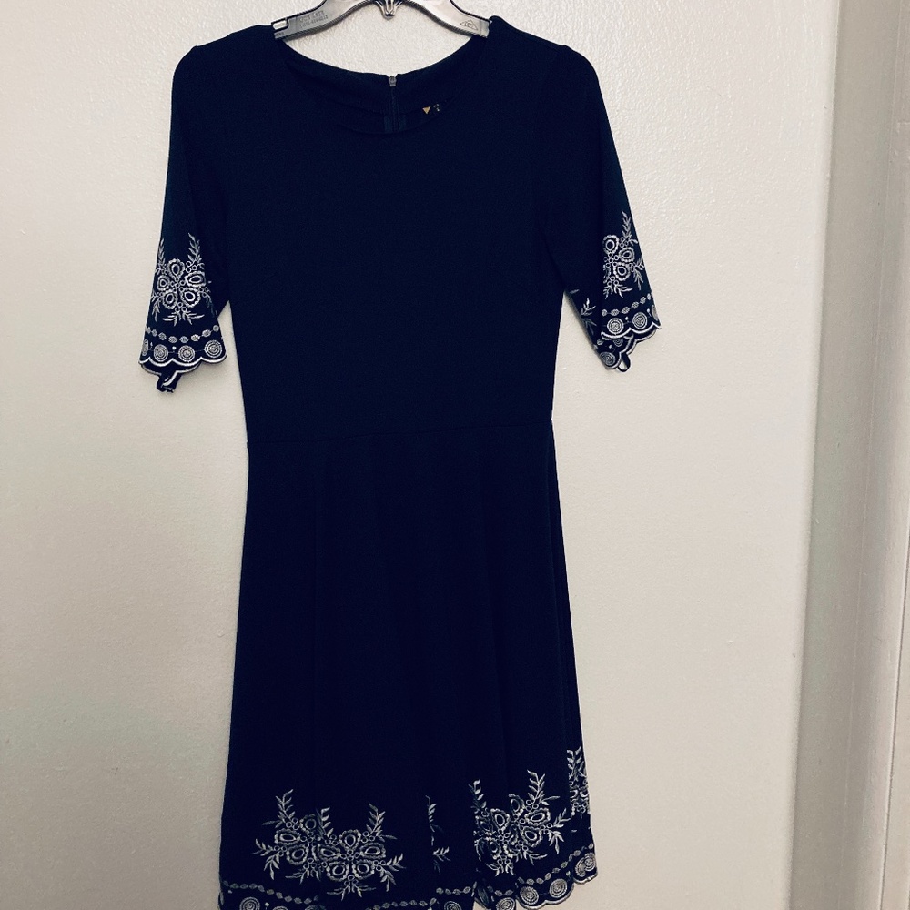 Navy blue dress with floral ornament